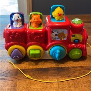Vtech roll & surprise animal train.